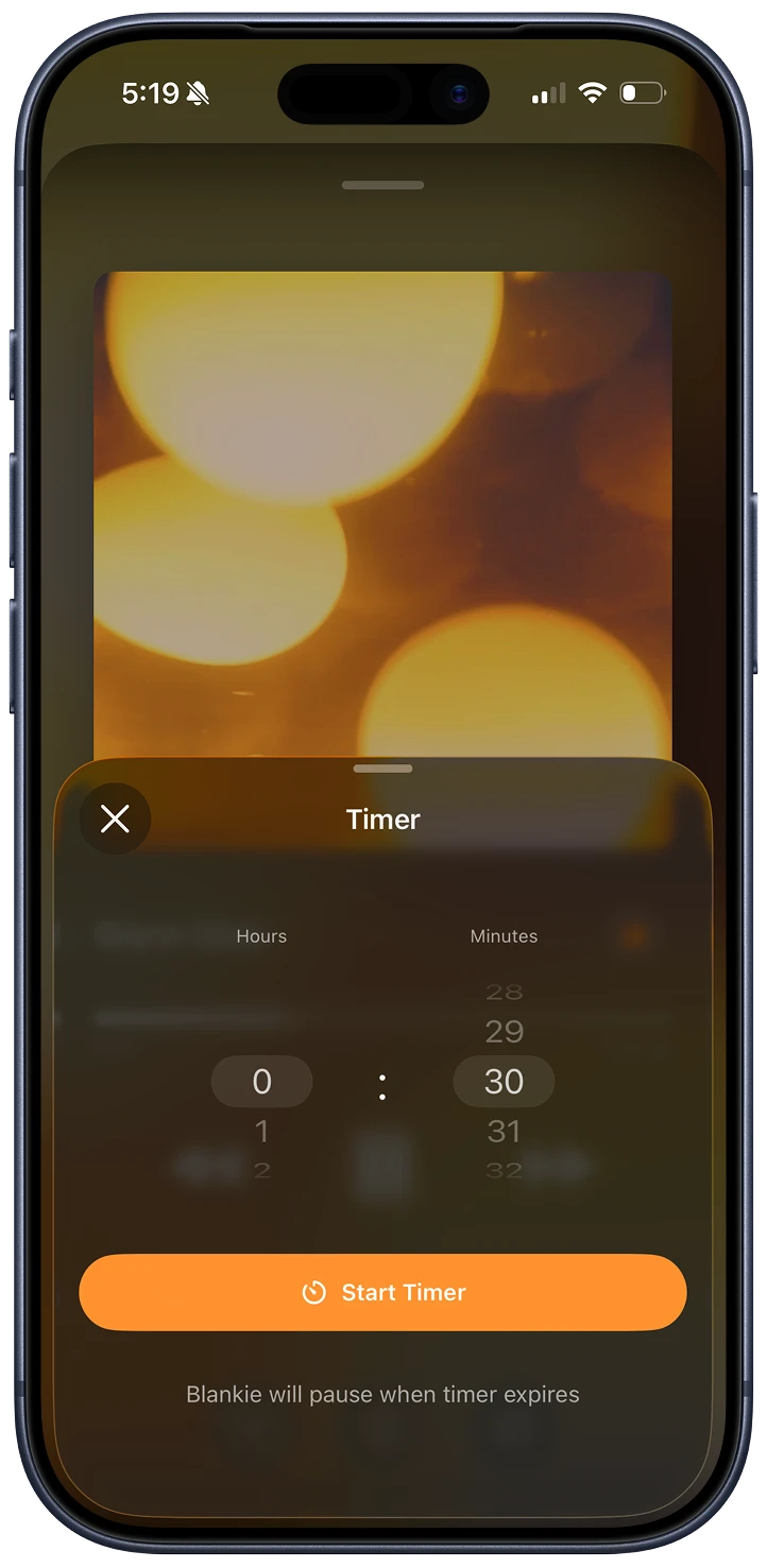 Blankie's sleep timer on iPhone over warm artwork